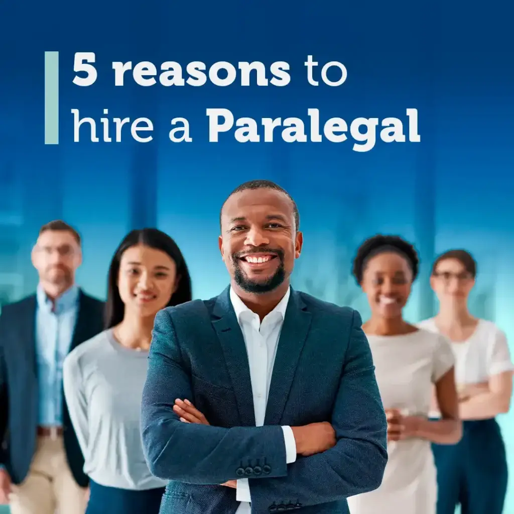 Image with five professionals smiling in a corporate environment, highlighting the 5 reasons to hire a paralegal.